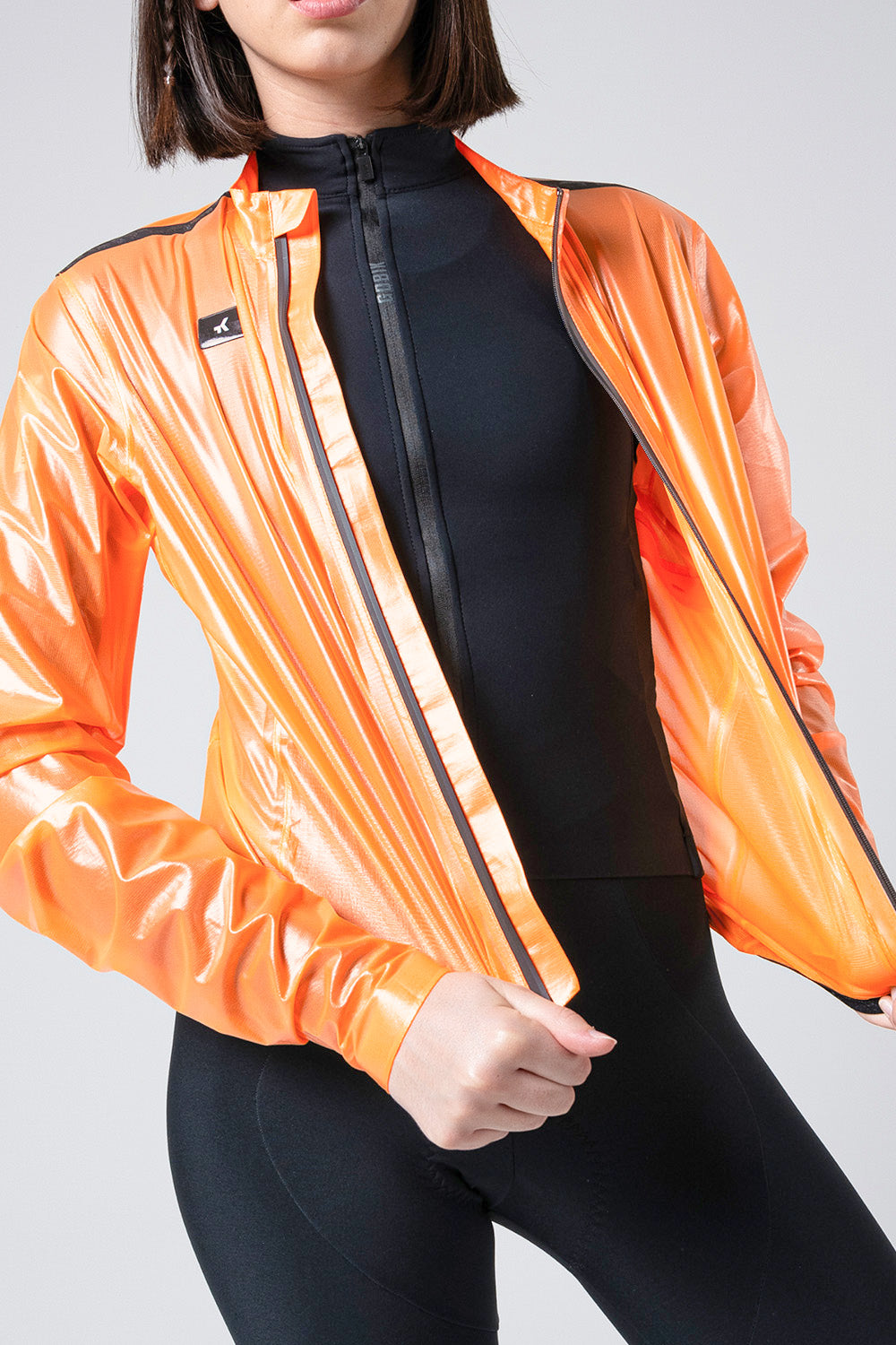 10-05-009-002-lightweight-rain-jacket-pluvia-2-0-women-blazing-orange-02