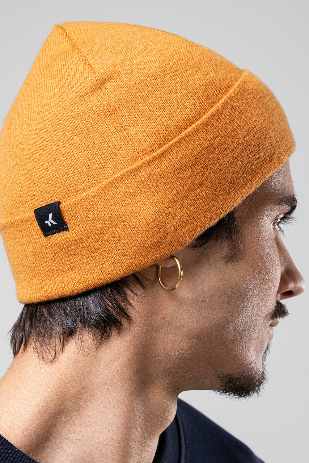 CAP MERINO CREST UNISEX RUST